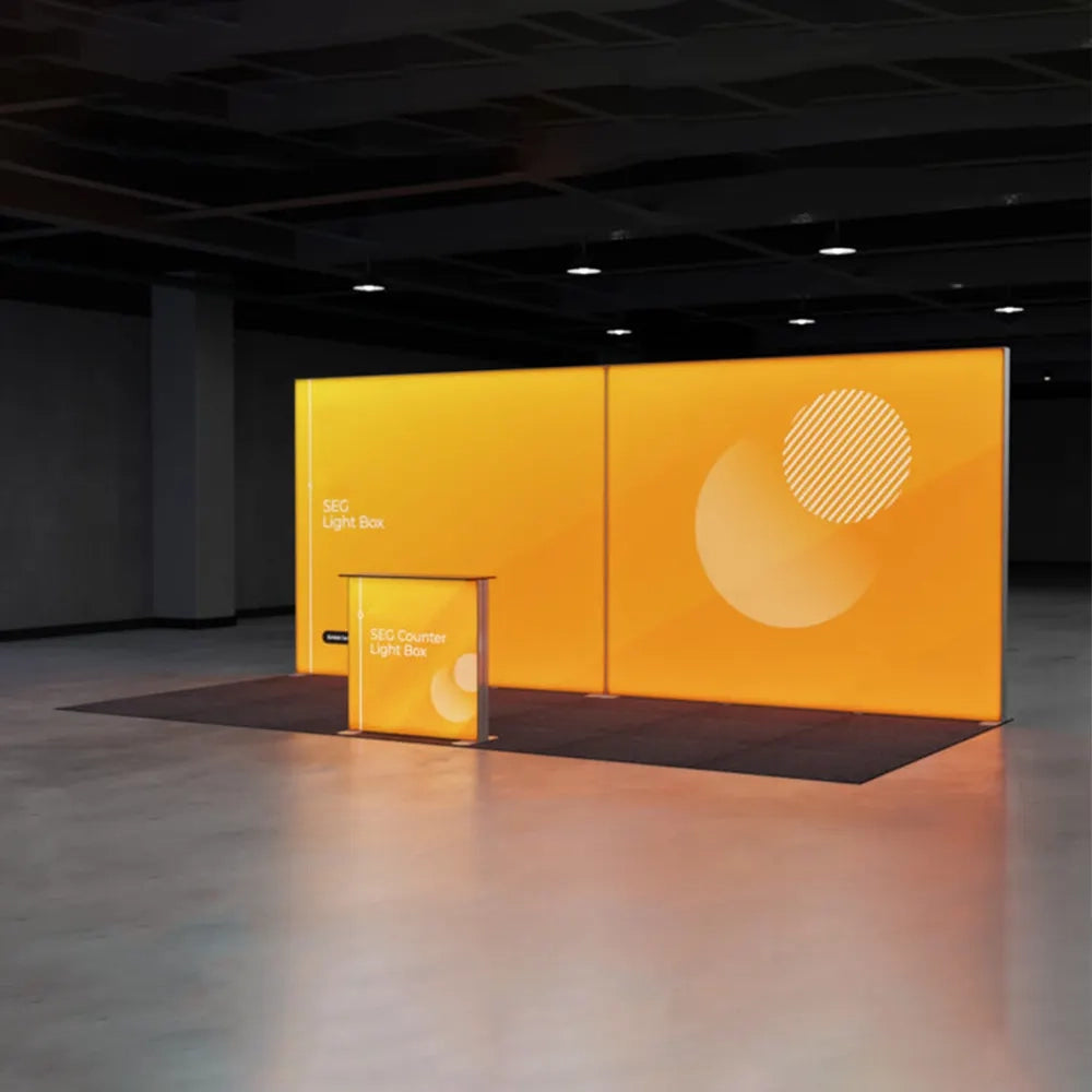 Yellow light boxes with geometric designs on a dark floor.