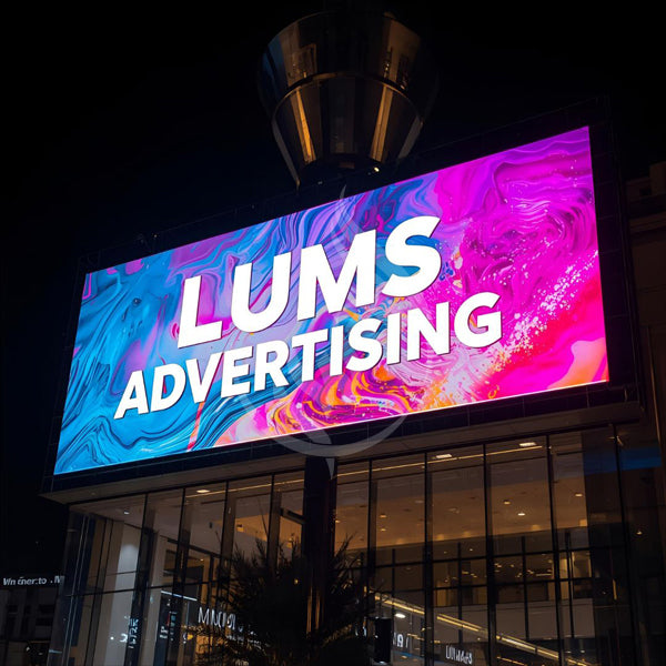 LUMS Advertising sign on a building at night