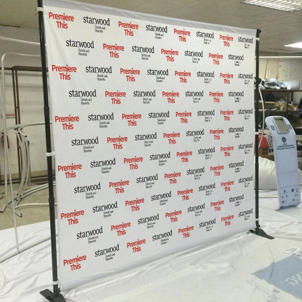 Step and repeat banner with 'Starwood' branding in a room setting