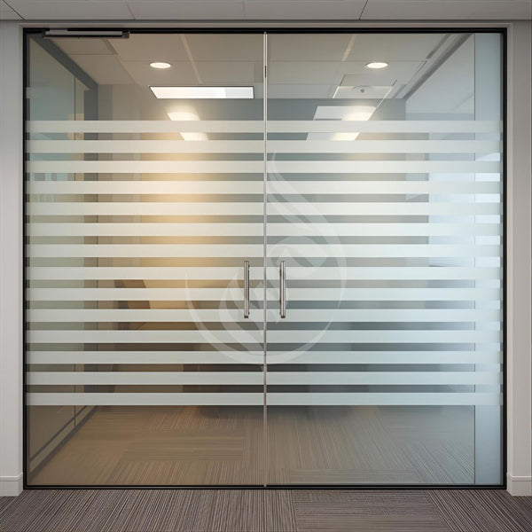 Glass office door with frosted design in an indoor setting